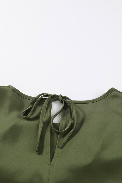 Blusa elegante de manga larga con cuello vuelto negro