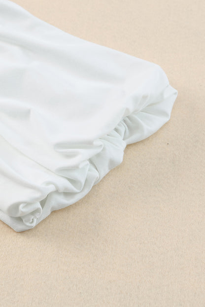 Chemisier à col rond et manches bouffantes 