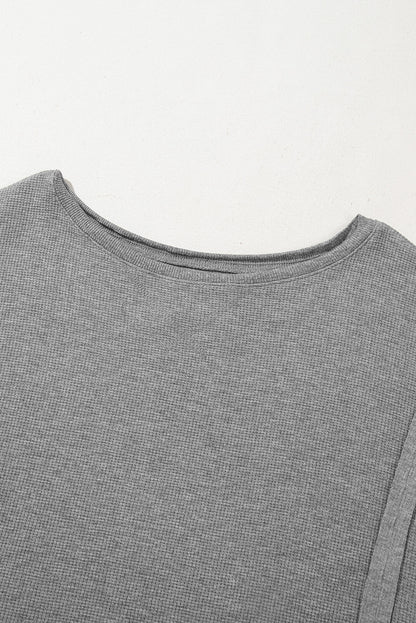 Haut surdimensionné fendu à manches évasées en tricot gaufré gris