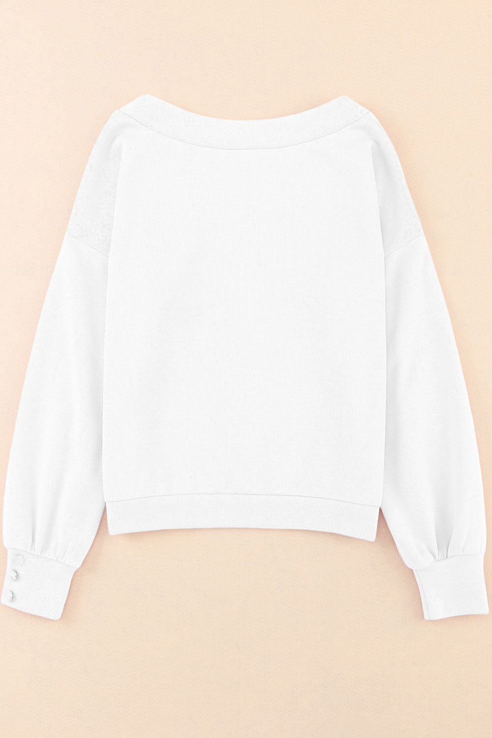 Pull violet en tricot à col en V et poignets boutonnés