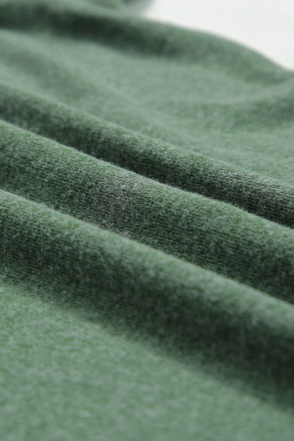 Haut Henley noir à manches longues et boutons-pression