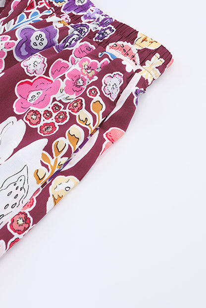 Chemisier à manches bouffantes et motifs floraux multicolores 