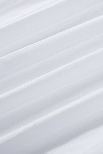 Camisa con botones texturizados y bolsillos