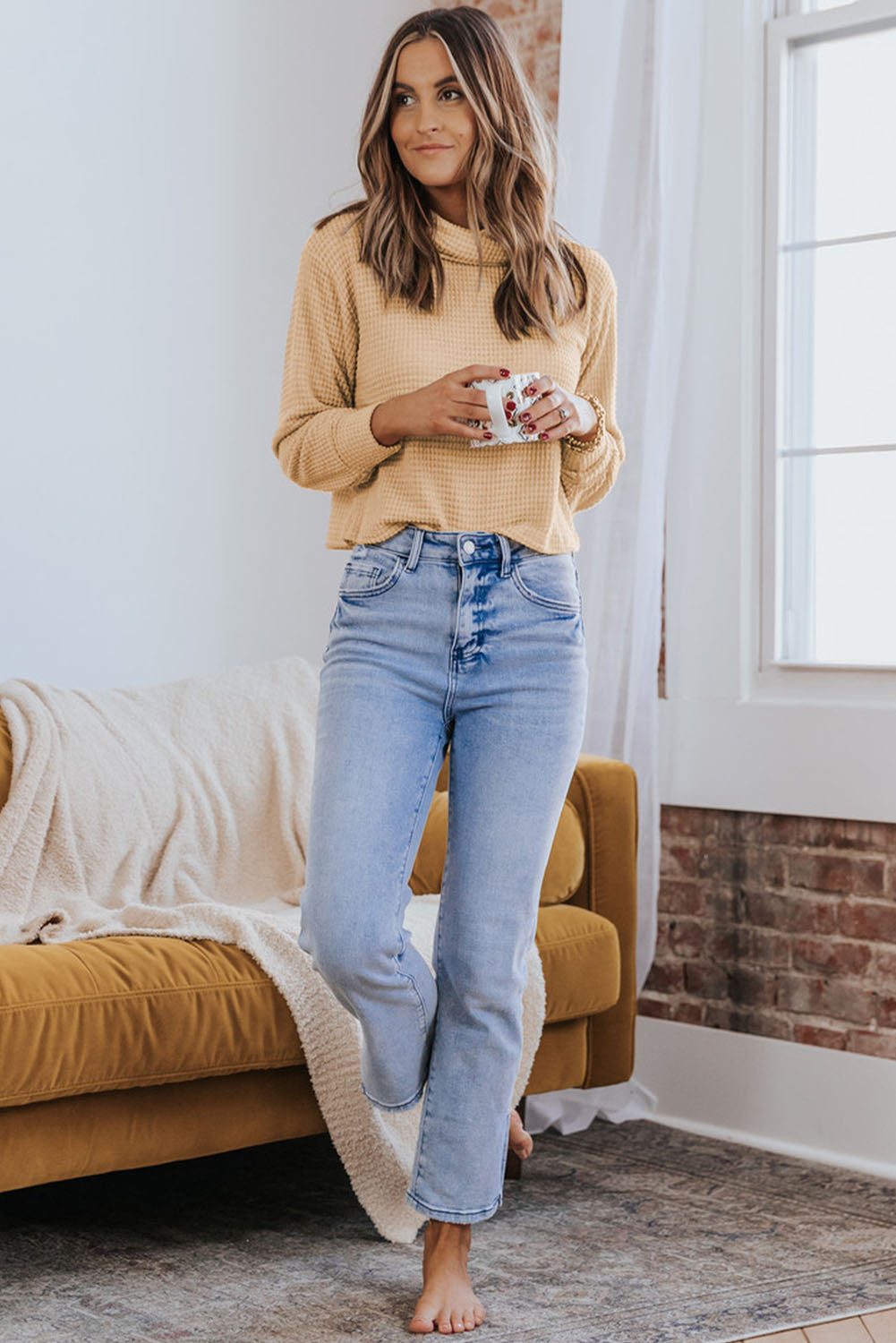 Haut à col roulé et manches longues en tricot gaufré uni abricot 
