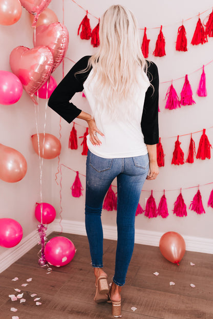 Haut raglan à motif flocons de neige et sapin de Noël