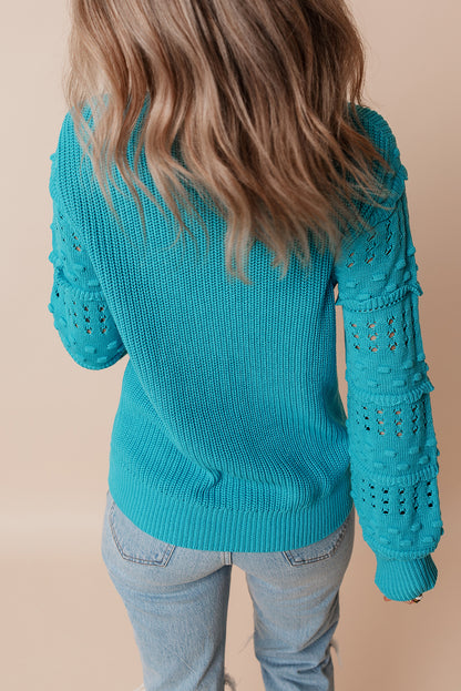 Pull turquoise à volants et manches bouffantes