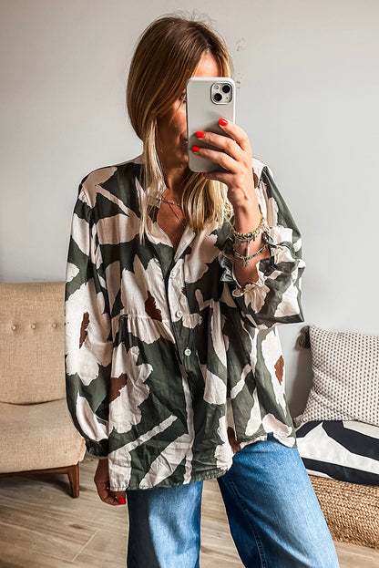 Chemisier à manches bouffantes et demi-bouton à imprimé floral abstrait trèfle à quatre feuilles