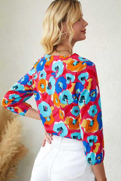 Blusa con cuello en V y manga 3/4 con estampado floral multicolor 