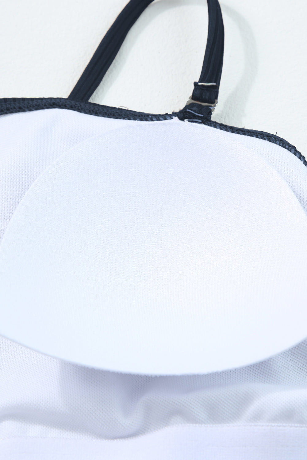 Maillot de bain une pièce bleu marine côtelé avec cordon de serrage et découpes sur les côtés