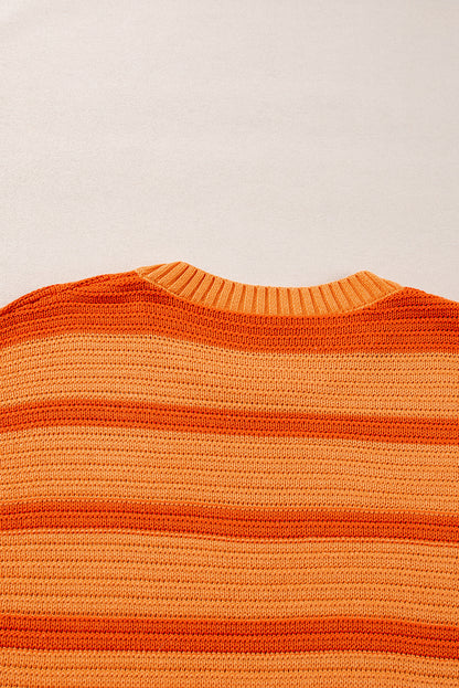 Pull ample à rayures orange et blocs de couleurs, col ras du cou et épaules tombantes