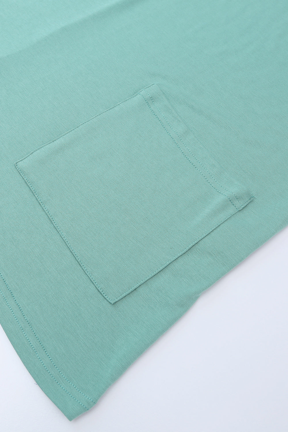 Tunique à manches courtes avec poches latérales 