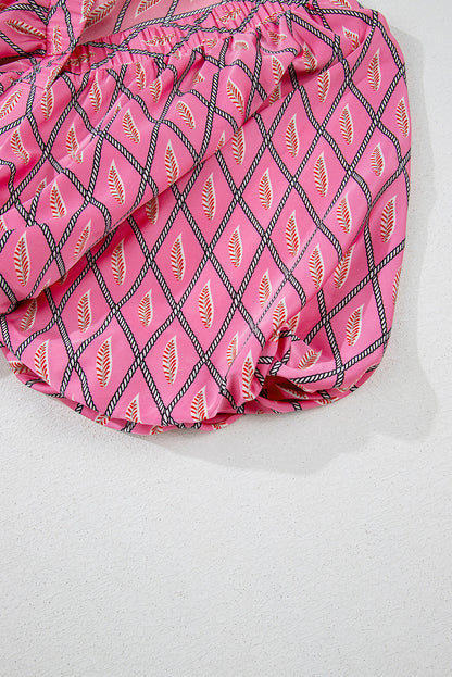 Combinaison taille haute à col en V et imprimé géométrique cachemire rose