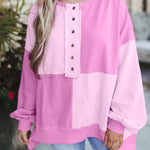 Sweat-shirt oversize rose colorblock à col montant et manches longues