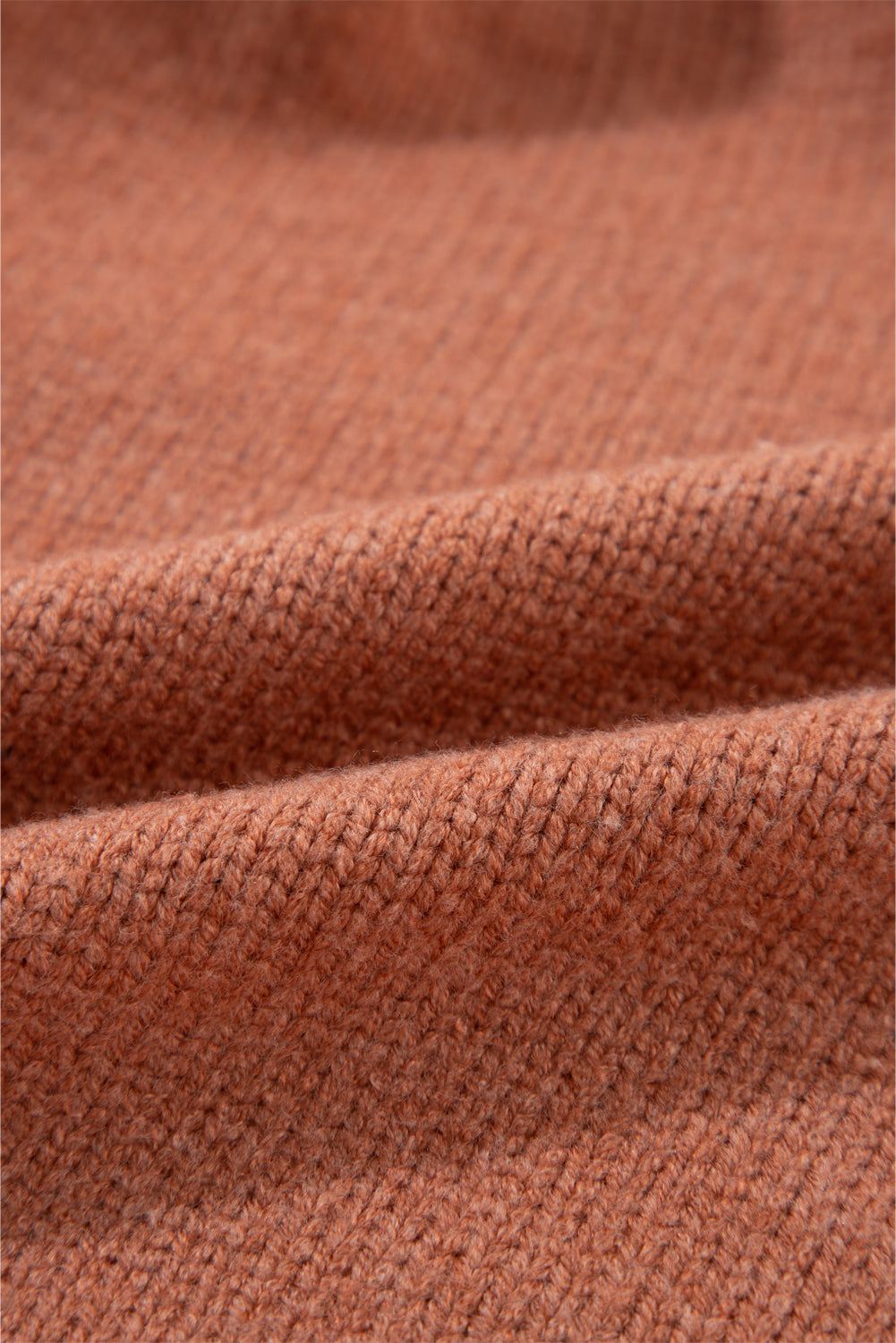 Cardigan court ouvert sur le devant beige clair à épaules tombantes