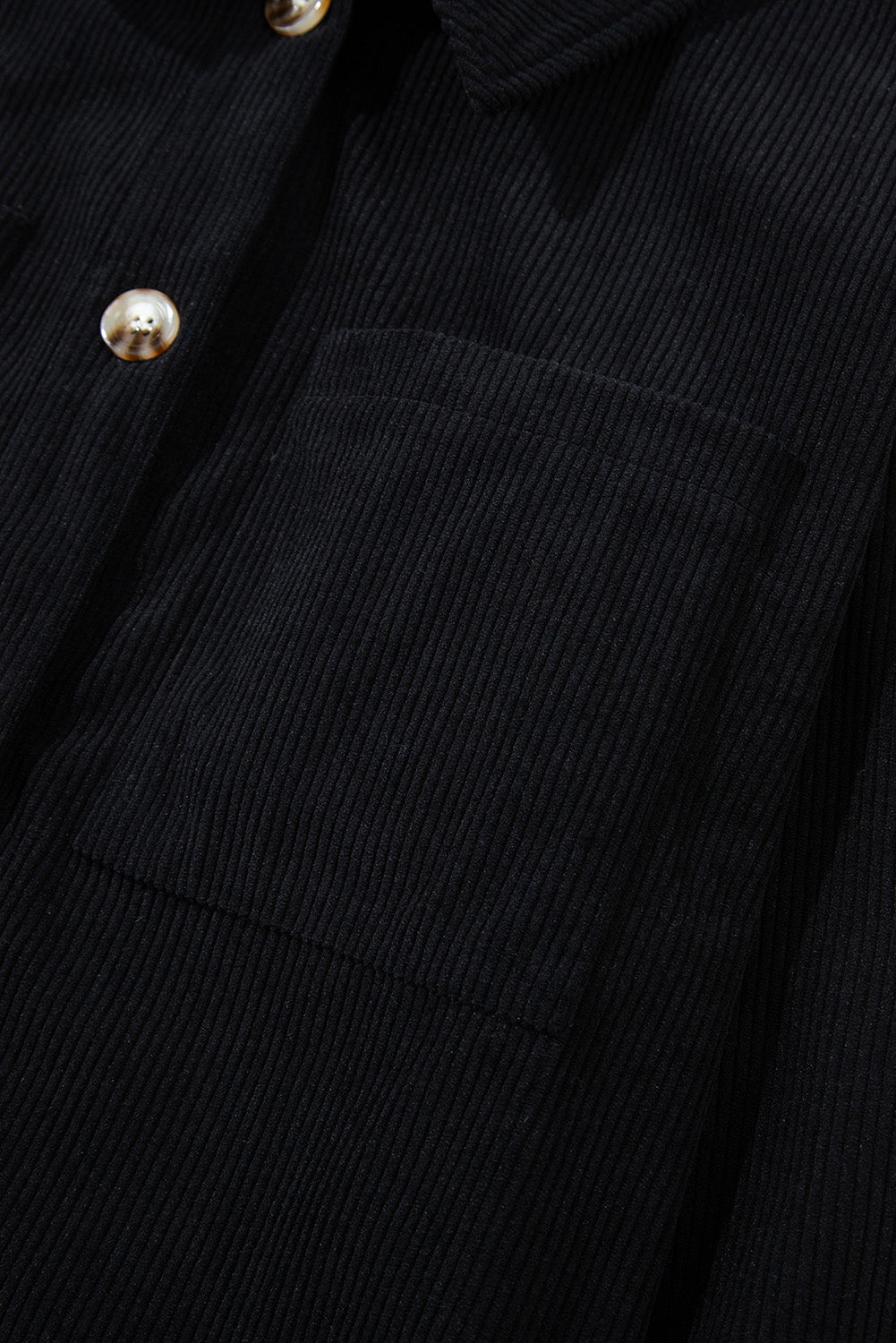 Veste-chemise noire en velours côtelé avec capuche et poches à cordon