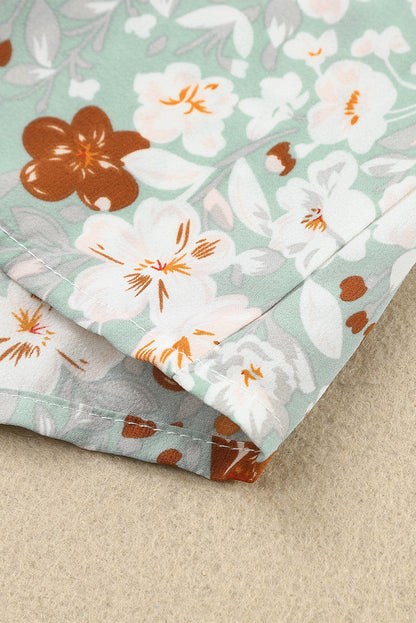 Blusa con botones y cuello en V con estampado floral 