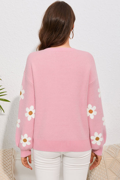 Pull à épaules tombantes et motif floral rose 