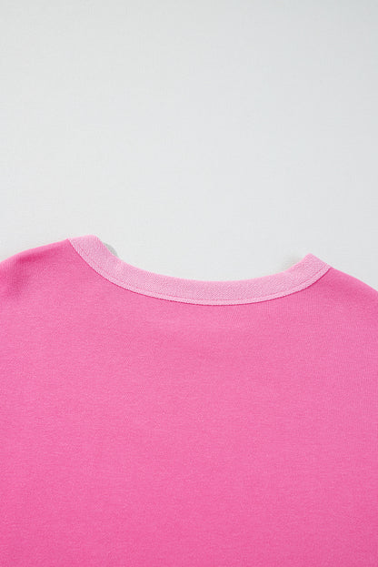 Ensemble haut à manches longues et short rose à imprimé patchwork