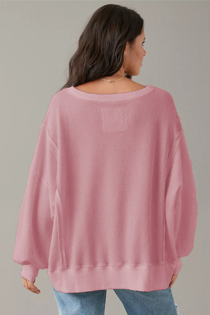 Sweat-shirt surdimensionné fendu à manches évasées en tricot gaufré rose