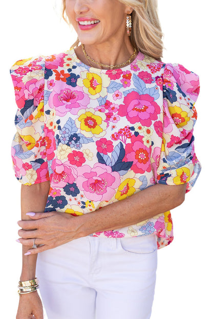 Blusa floral con mangas abullonadas fruncidas