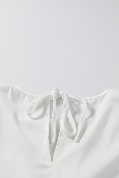 Blusa elegante de manga larga con cuello vuelto negro