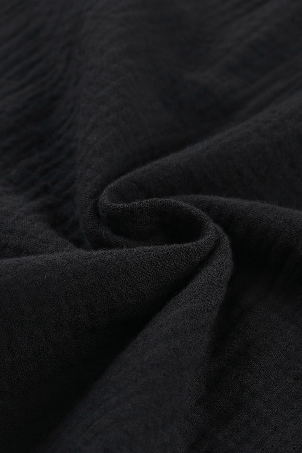 Chemisier texturé à manches flottantes et col à volants 