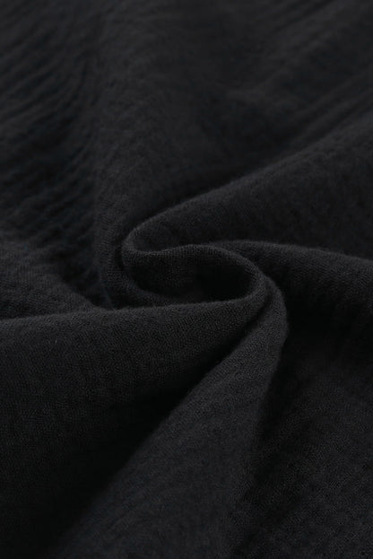 Chemisier texturé à manches flottantes et col à volants 