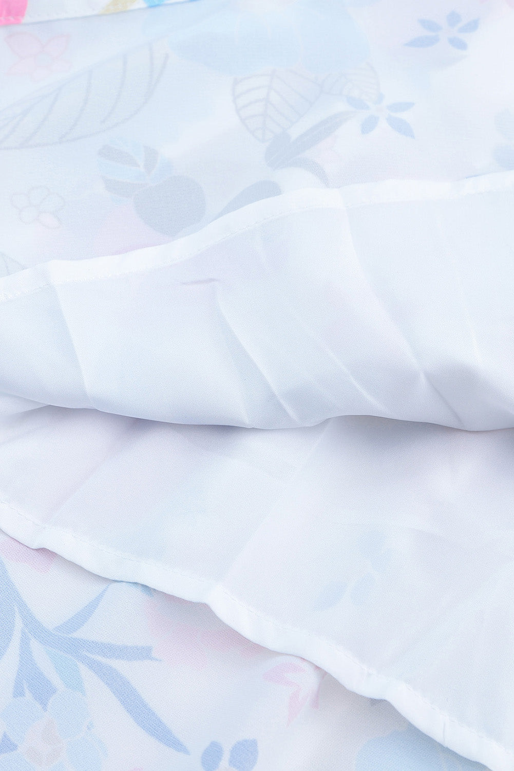 Robe fleurie à volants, col montant, sans manches, à volants et à volants