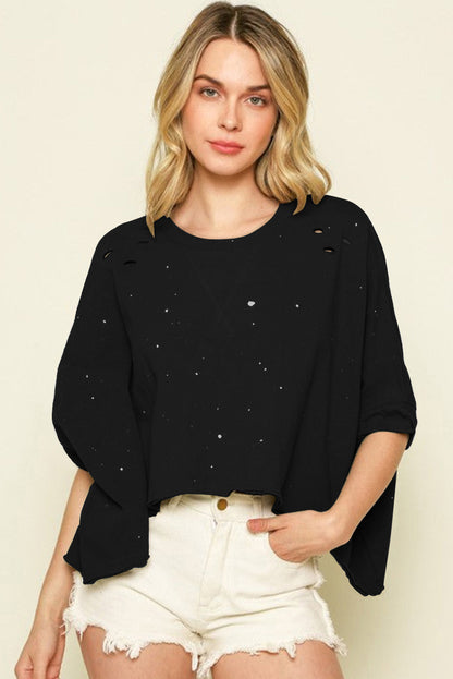 Haut à manches courtes et ourlet asymétrique délavé et vieilli