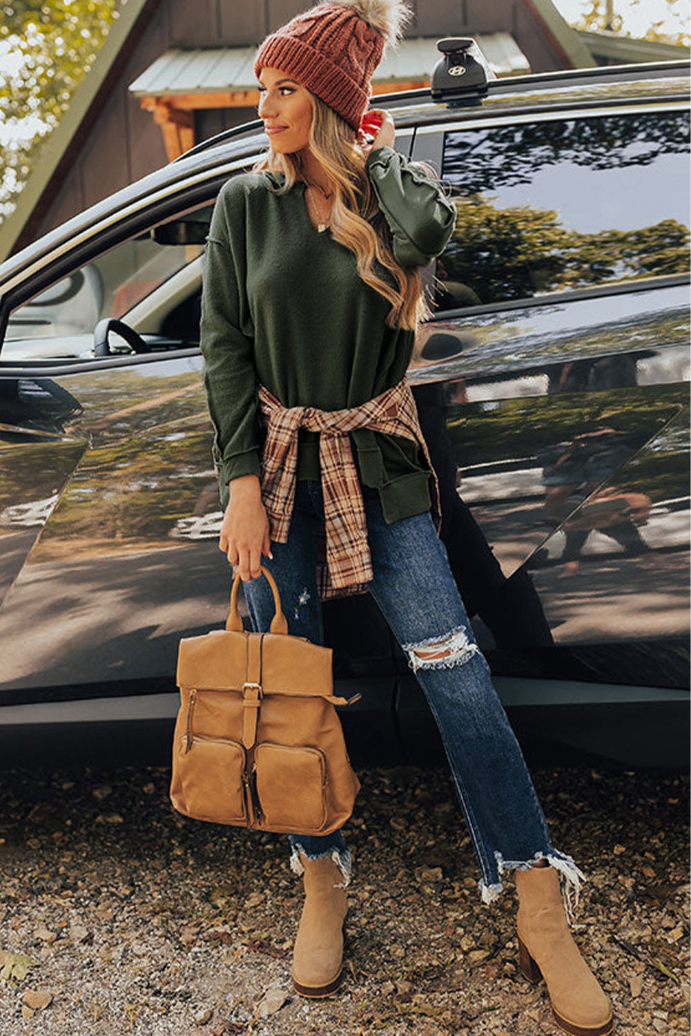 Haut vert à manches longues et col fendu avec coutures apparentes 