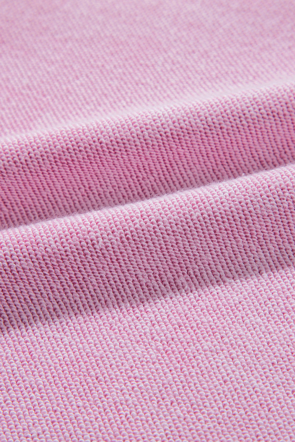 Sweat-shirt raglan rose en maille gaufrée avec coutures apparentes