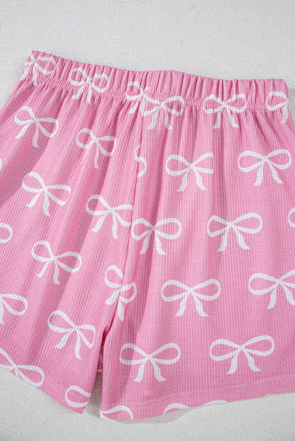 Ensemble t-shirt col V et short en tricot gaufré rose imprimé nœud papillon