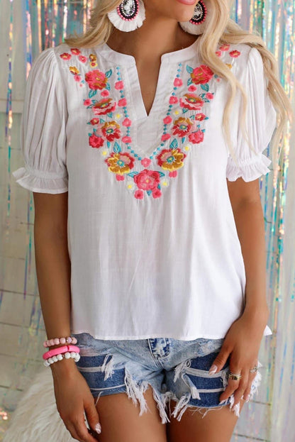Blusa de manga farol con volantes y bordado floral 