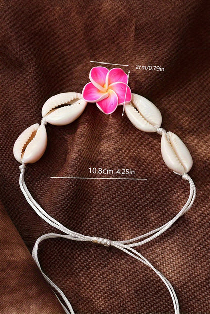 Bracelet ajustable en coquillage et fleur blanche