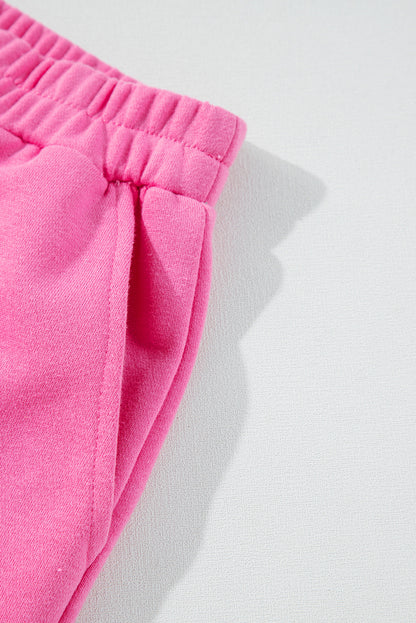 Ensemble haut à manches longues et short rose à imprimé patchwork