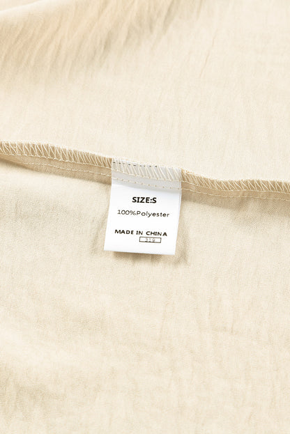 Top tipo cambio de muñeca fruncido