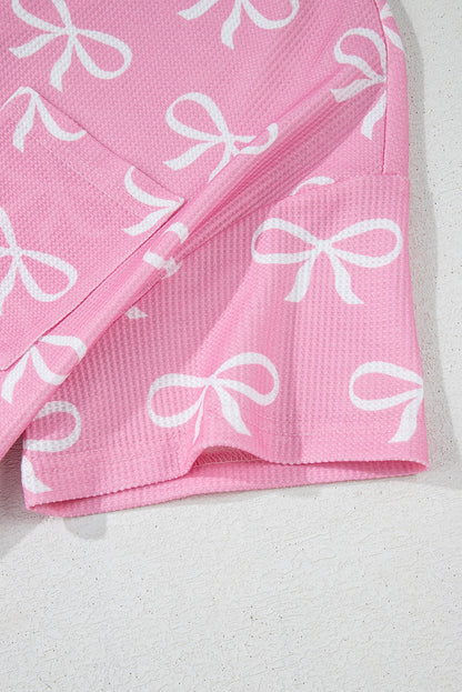 Ensemble t-shirt col V et short en tricot gaufré rose imprimé nœud papillon