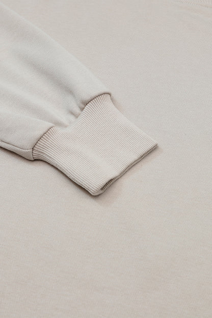 Tenue de détente avec haut à manches longues gris et pantalon à cordon