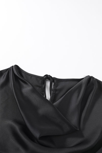 Blusa elegante de manga larga con cuello vuelto negro