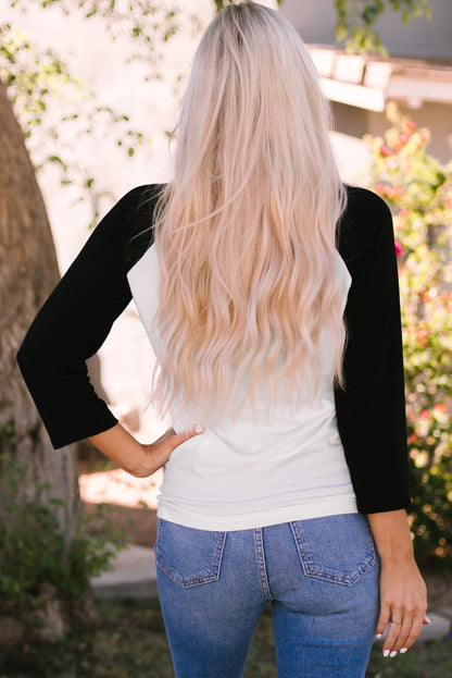 Haut raglan à motif flocons de neige et sapin de Noël