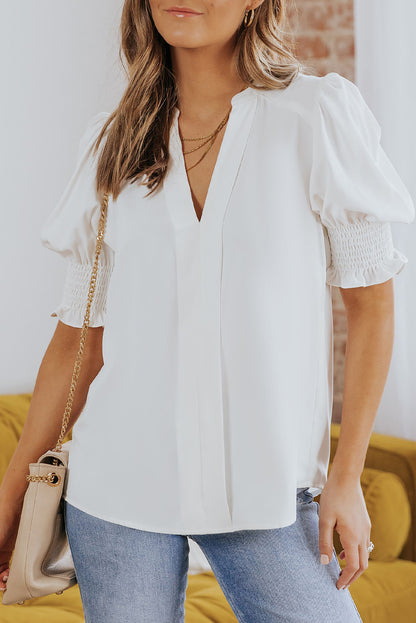 Blusa con cuello en V y media manga de color liso