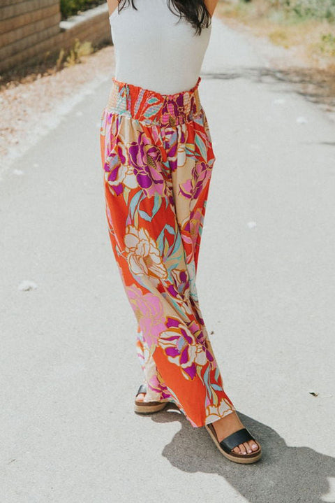 Pantalones súper sueltos con cintura fruncida floral boho de avena