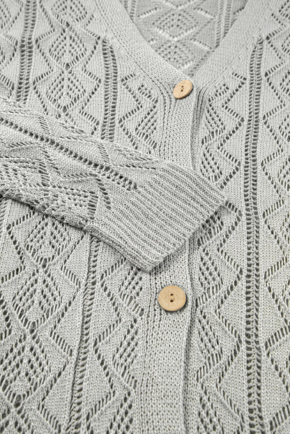 Cardigan long gris à boutons ajourés sur le devant