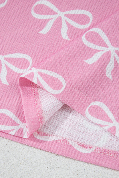 Ensemble t-shirt col V et short en tricot gaufré rose imprimé nœud papillon