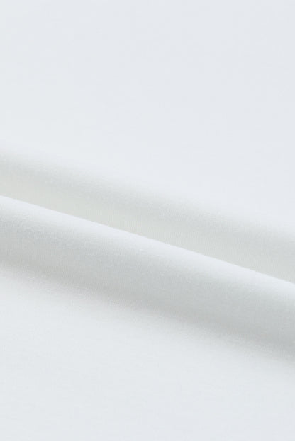 Chemisier à col rond et manches bouffantes 