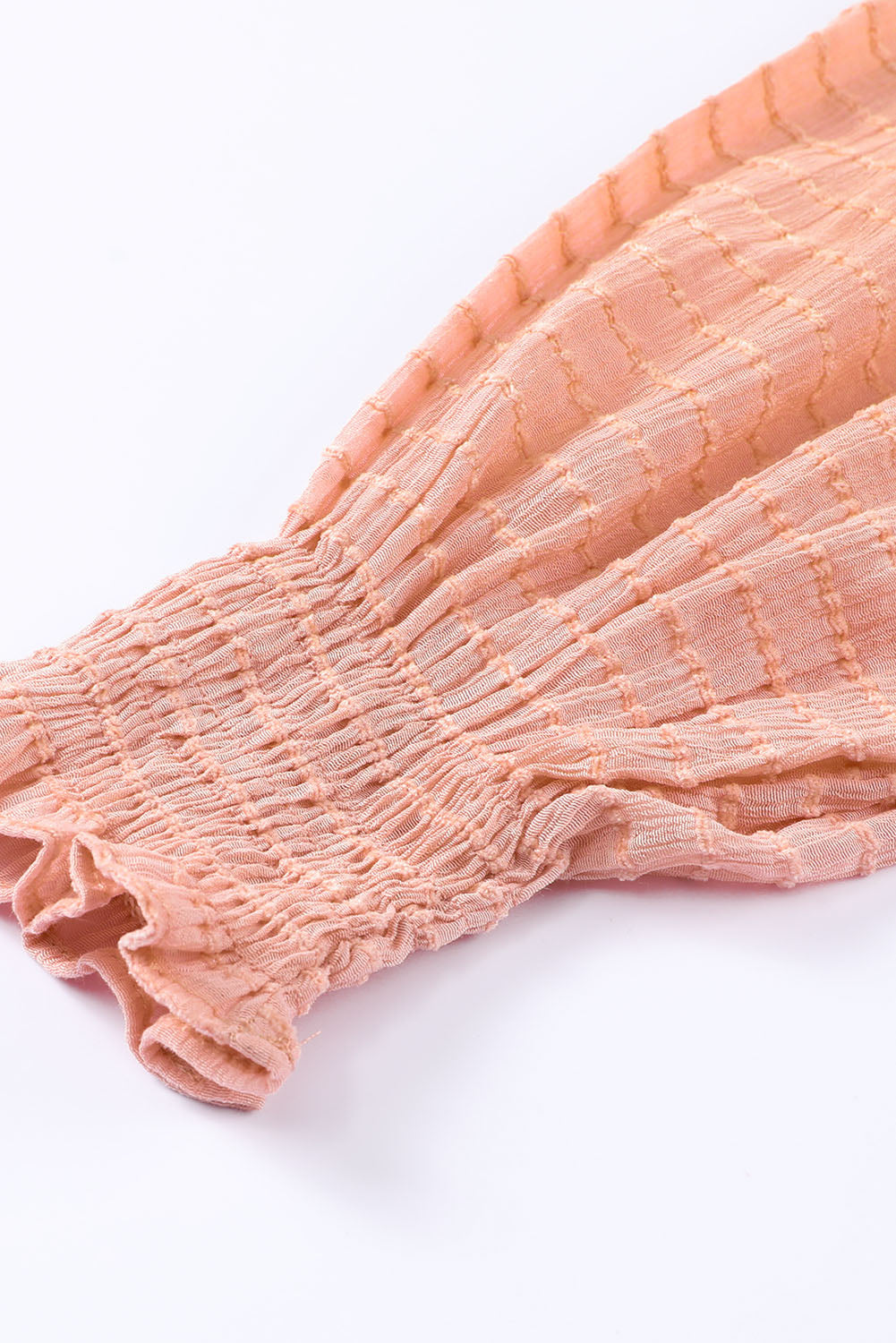 Chemisier péplum texturé noué sur le devant 