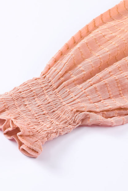 Chemisier péplum texturé noué sur le devant 