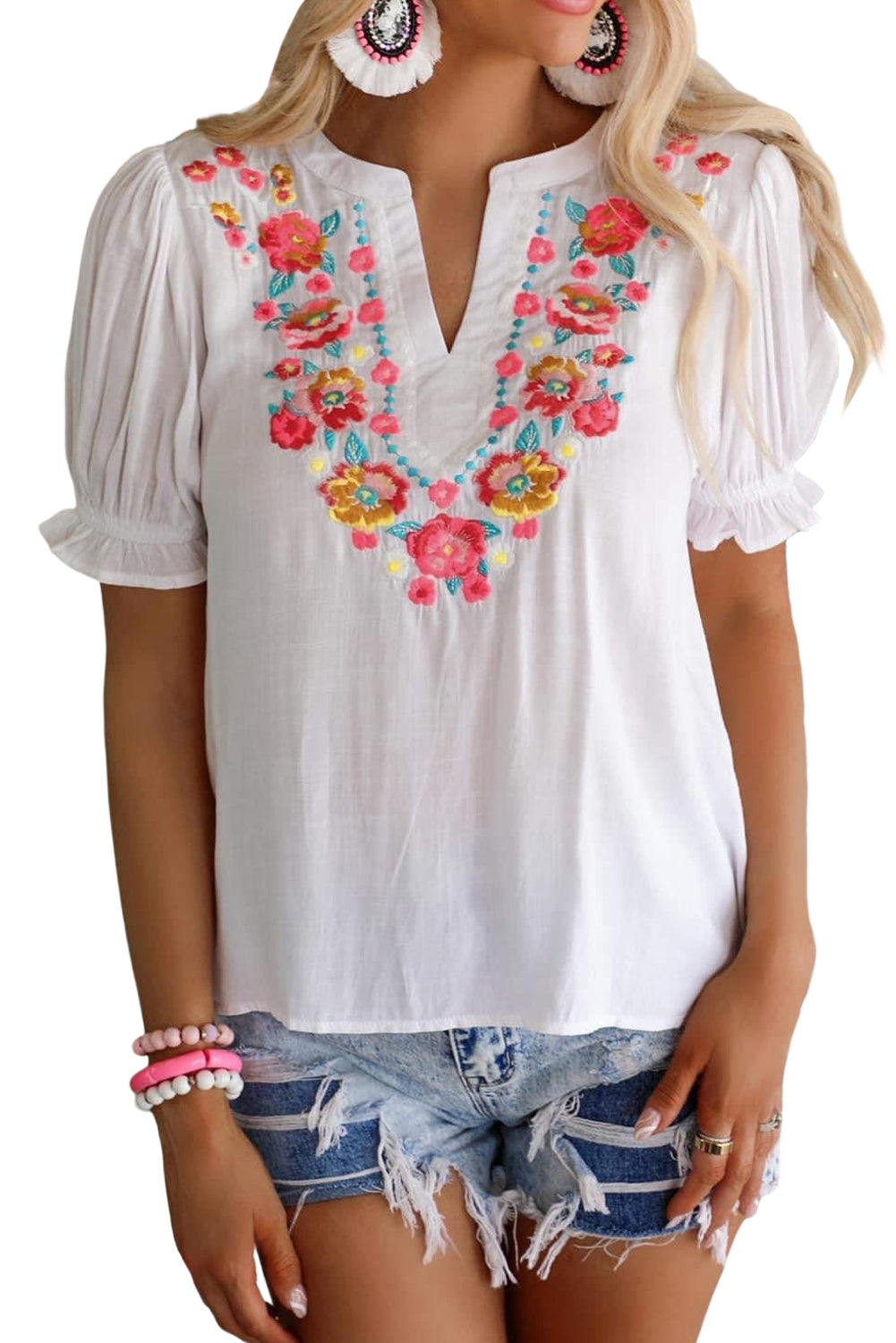 Blusa de manga farol con volantes y bordado floral 