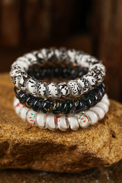 Coletero con cordón para teléfono floral negro