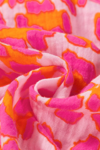 Chemise ample boutonnée à imprimé léopard rose